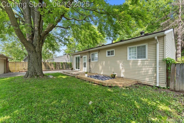35245 Wick Rd, Romulus, MI 48174 - back of property featuring a fenced backyard and a wooden deck