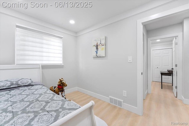 35245 Wick Rd, Romulus, MI 48174 - bedroom with light wood-type flooring and recessed lighting