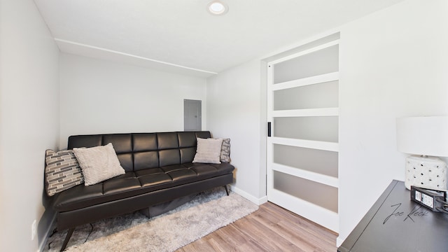 1204 Witham Rd, Muskegon, MI 49445 - living area featuring wood finished floors and electric panel