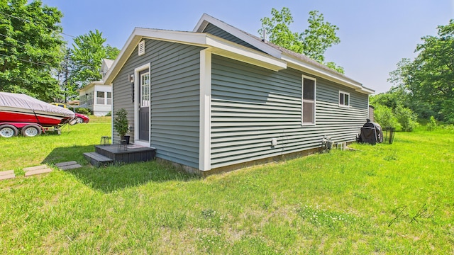 1204 Witham Rd, Muskegon, MI 49445 - view of property exterior featuring a yard