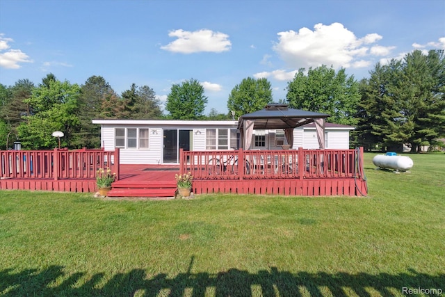 8031 Vassar Rd, Millington, MI 48746 - rear view of house featuring a gazebo, a deck, and a yard
