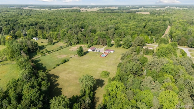 8031 Vassar Rd, Millington, MI 48746 - view of property location with a heavily wooded area