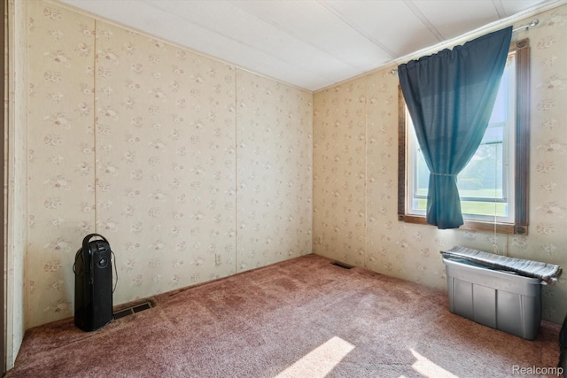 8031 Vassar Rd, Millington, MI 48746 - unfurnished room with carpet floors and wallpapered walls