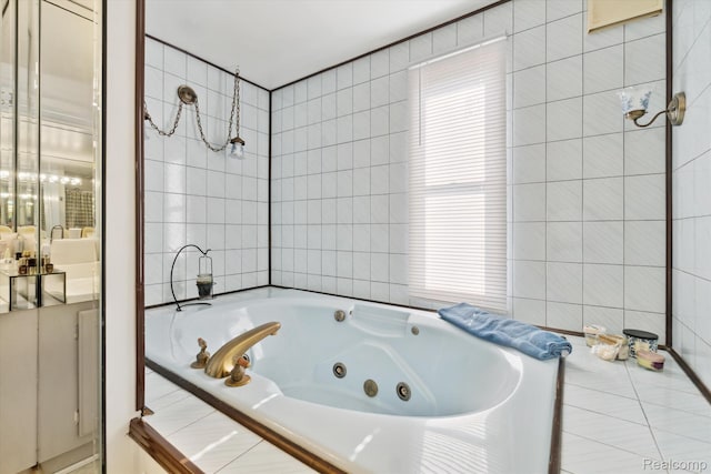8031 Vassar Rd, Millington, MI 48746 - bathroom with a whirlpool tub and tile walls