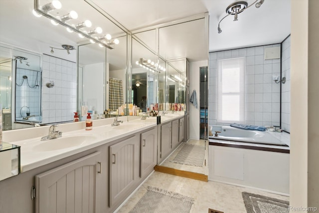 8031 Vassar Rd, Millington, MI 48746 - bathroom featuring double vanity, a shower, and a bath