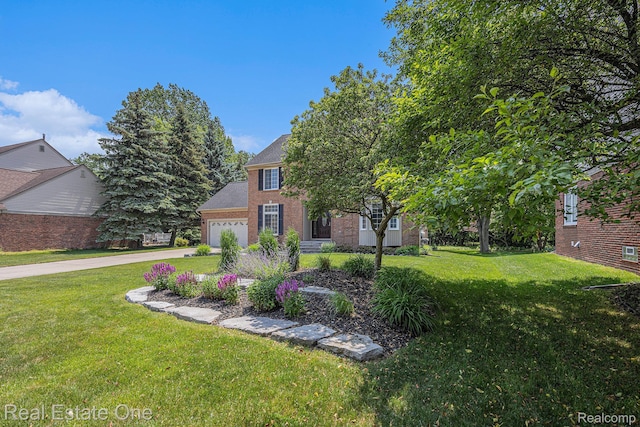 2842 Manorwood Dr, Troy, MI 48085 - view of front facade featuring brick siding, driveway, a front lawn, and a garage