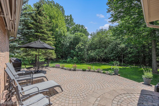 2842 Manorwood Dr, Troy, MI 48085 - view of patio / terrace featuring area for grilling, outdoor dining area, and view of scattered trees