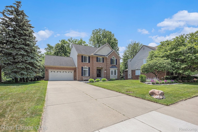 2842 Manorwood Dr, Troy, MI 48085 - colonial-style house featuring a garage, a front yard, brick siding, and concrete driveway