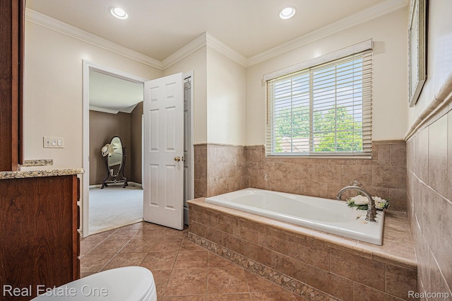 2842 Manorwood Dr, Troy, MI 48085 - bathroom featuring a garden tub, tile patterned flooring, ornamental molding, vanity, and recessed lighting