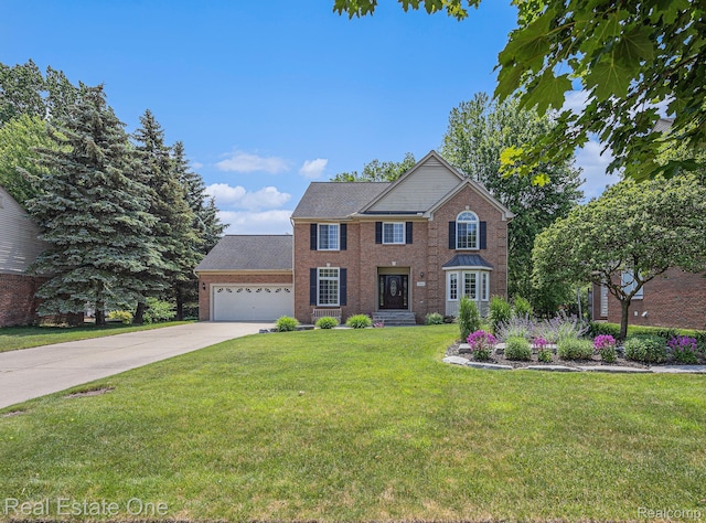 2842 Manorwood Dr, Troy, MI 48085 - view of front of home featuring concrete driveway, an attached garage, a front yard, and brick siding