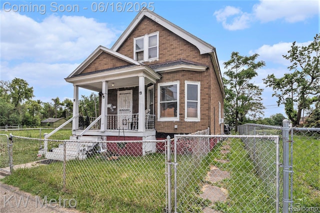 3620 Holborn St, Detroit, MI 48211 - view of front of house with a gate, a porch, and a fenced front yard