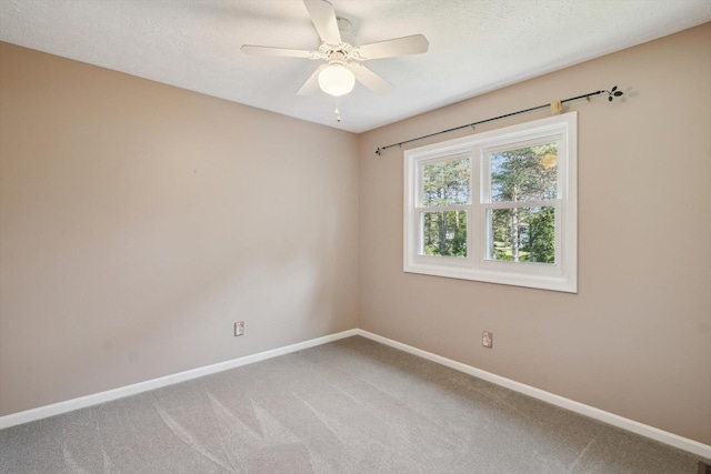 4540 Spinnaker Ln, Pleasant Lake, MI 49272 - spare room featuring carpet floors, ceiling fan, and a textured ceiling