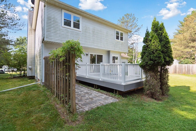 4540 Spinnaker Ln, Pleasant Lake, MI 49272 - back of property featuring a wooden deck and a chimney