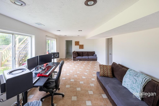 1591 Lillyview Ct SW, Wyoming, MI 49509 - office featuring a textured ceiling