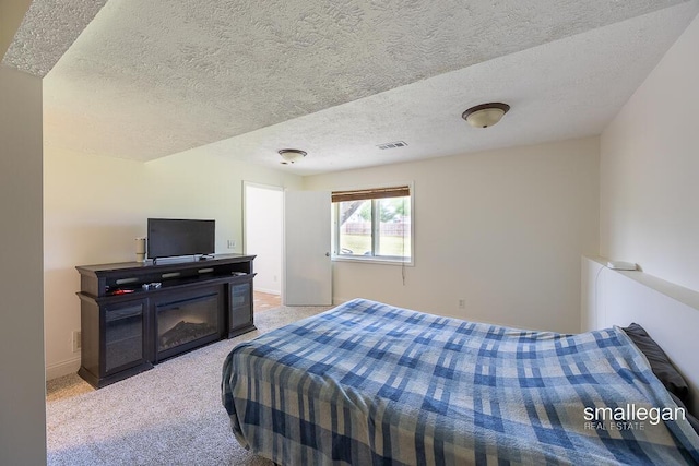 1591 Lillyview Ct SW, Wyoming, MI 49509 - bedroom with light carpet and a textured ceiling