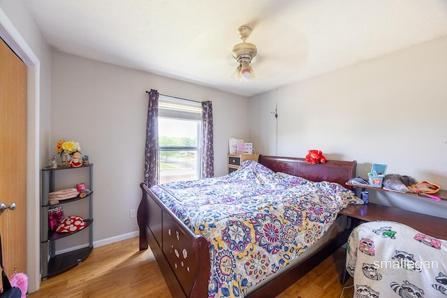 1591 Lillyview Ct SW, Wyoming, MI 49509 - bedroom with wood finished floors and a ceiling fan