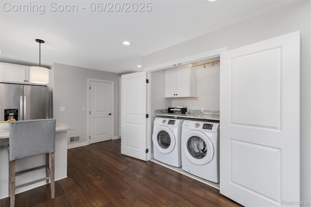 3923 Maple Ln, Auburn Hills, MI 48326 - laundry room with washer and clothes dryer, dark wood-type flooring, and recessed lighting