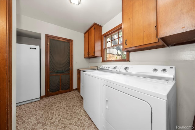 26165 Hidden Valley Dr, Farmington Hills, MI 48331 - laundry room featuring independent washer and dryer and cabinet space