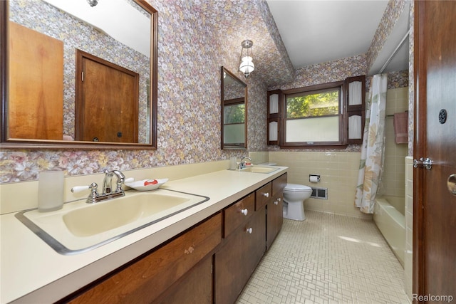 26165 Hidden Valley Dr, Farmington Hills, MI 48331 - bathroom featuring wallpapered walls, double vanity, tile patterned floors, and shower / bath combo