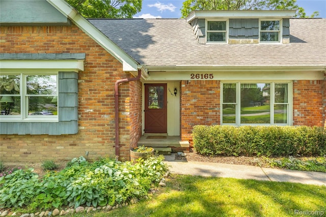 26165 Hidden Valley Dr, Farmington Hills, MI 48331 - property entrance featuring brick siding and a shingled roof