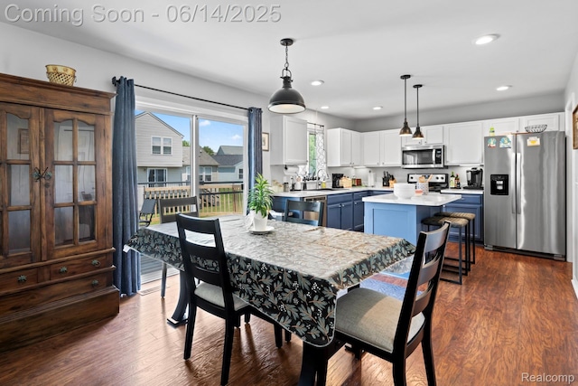 5031 Meadow Crest Cir, Holly, MI 48442 - dining area featuring recessed lighting and dark wood finished floors