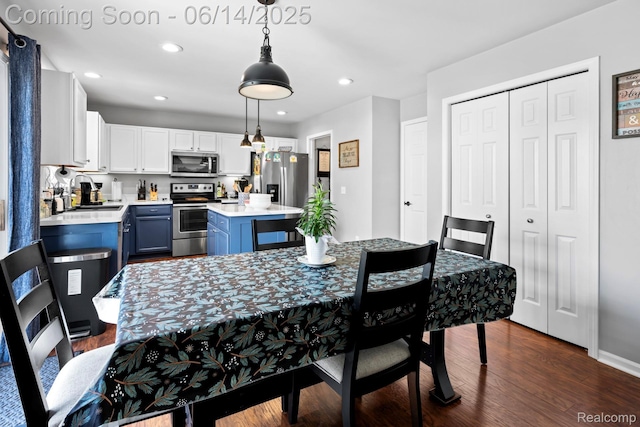 5031 Meadow Crest Cir, Holly, MI 48442 - dining space with dark wood-style flooring and recessed lighting