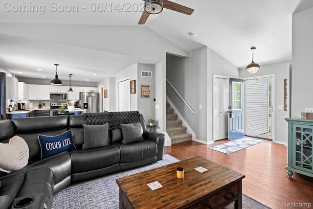 5031 Meadow Crest Cir, Holly, MI 48442 - living room featuring vaulted ceiling, a ceiling fan, dark wood finished floors, stairway, and recessed lighting