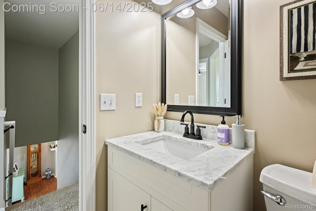 5031 Meadow Crest Cir, Holly, MI 48442 - bathroom featuring vanity and wood finished floors