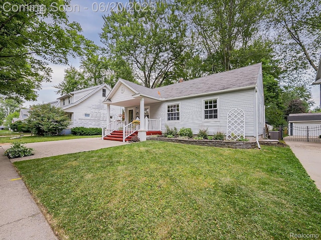 1036 Ferris Ave, Berkley, MI 48067 - view of front facade featuring a porch, concrete driveway, and a front lawn