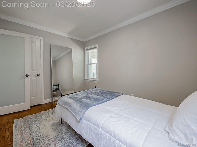 1036 Ferris Ave, Berkley, MI 48067 - bedroom with ornamental molding and wood finished floors
