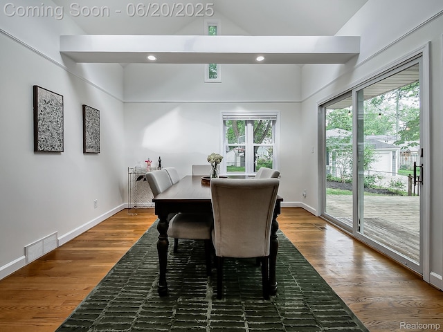 1036 Ferris Ave, Berkley, MI 48067 - dining area featuring healthy amount of natural light, vaulted ceiling, wood finished floors, and recessed lighting