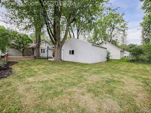 1036 Ferris Ave, Berkley, MI 48067 - view of yard featuring an outbuilding and a wooden deck