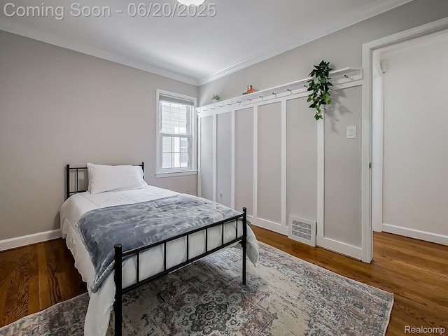 1036 Ferris Ave, Berkley, MI 48067 - bedroom with crown molding and wood finished floors
