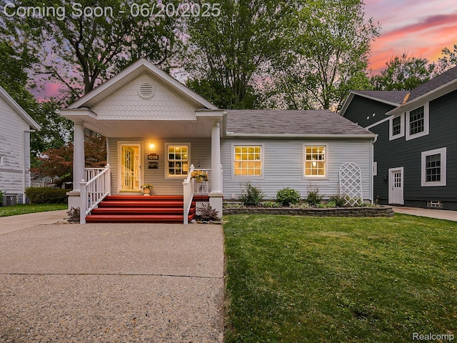 1036 Ferris Ave, Berkley, MI 48067 - view of front of house featuring a porch and a front yard
