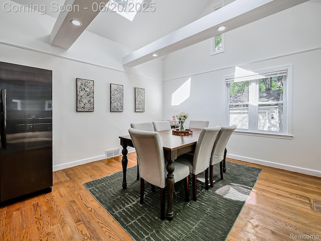 1036 Ferris Ave, Berkley, MI 48067 - dining space with recessed lighting, high vaulted ceiling, and wood finished floors