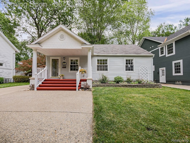 1036 Ferris Ave, Berkley, MI 48067 - view of front of house with a porch and a front yard