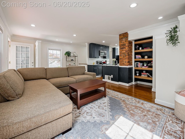 1036 Ferris Ave, Berkley, MI 48067 - living room with ornamental molding, wood finished floors, and recessed lighting