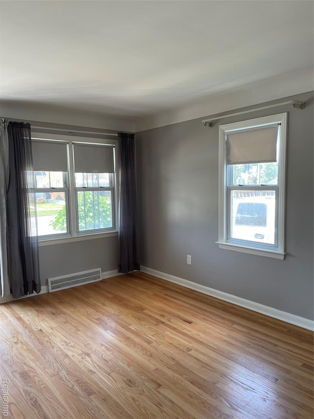 1154 Lincoln Ave, Rockwood, MI 48146 - unfurnished room with light wood-type flooring and baseboards