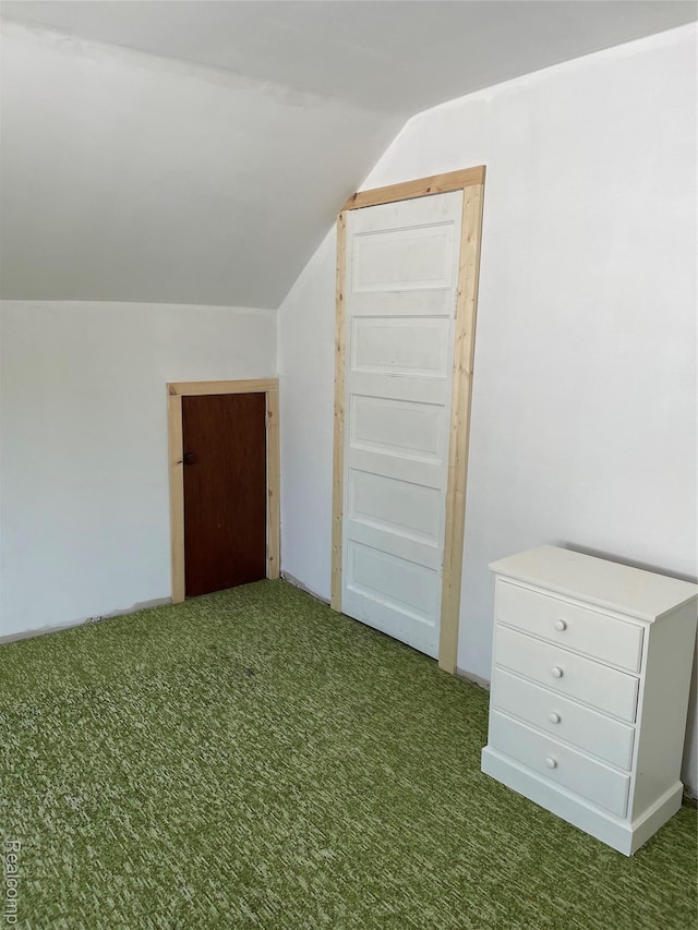 1154 Lincoln Ave, Rockwood, MI 48146 - additional living space with vaulted ceiling and carpet