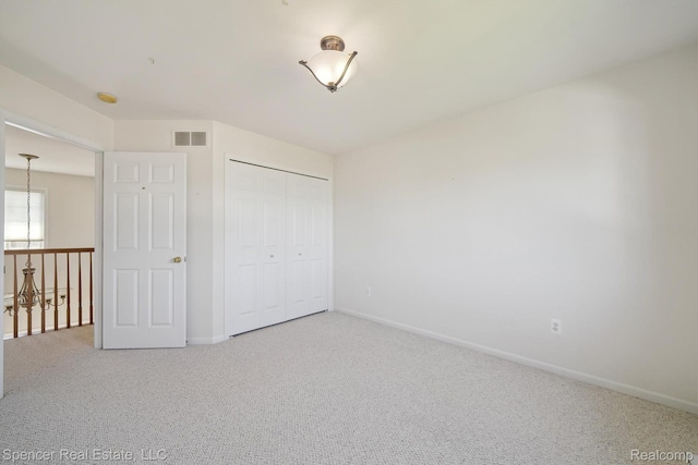 61 Old Carriage Ln, Lapeer, MI 48446 - unfurnished bedroom with carpet floors and a closet