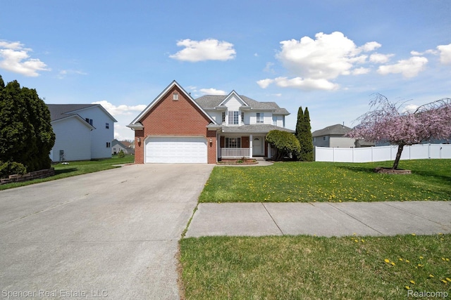61 Old Carriage Ln, Lapeer, MI 48446 - traditional-style home featuring driveway, an attached garage, and brick siding