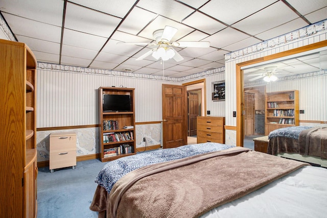 520 Groat Rd, Dowling, MI 49050 - bedroom with carpet flooring, wallpapered walls, a drop ceiling, and a closet