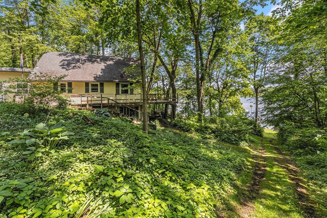 300 Basswood Ter, Brooklyn, MI 49230 - back of house with a wooden deck, a shingled roof, and stairs