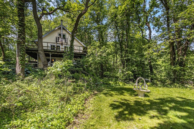 300 Basswood Ter, Brooklyn, MI 49230 - view of grassy yard with a deck