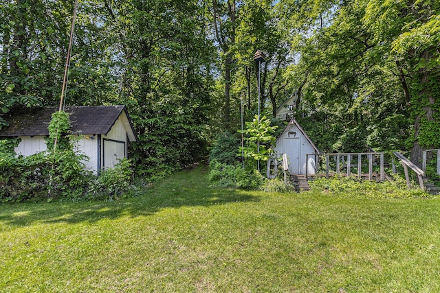300 Basswood Ter, Brooklyn, MI 49230 - view of green lawn featuring a storage shed
