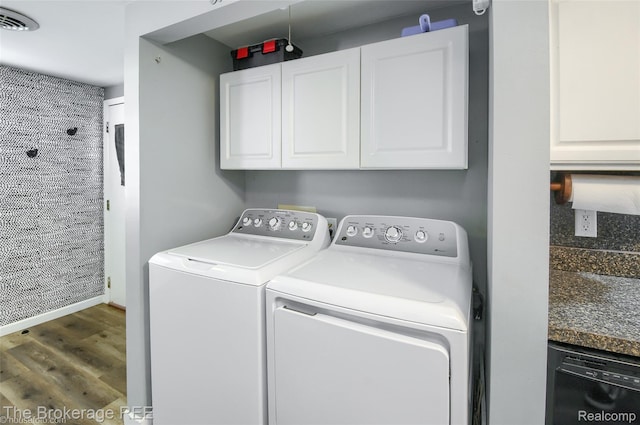 4462 Dye Rd, Swartz Creek, MI 48473 - laundry room with independent washer and dryer, dark wood-style floors, and cabinet space
