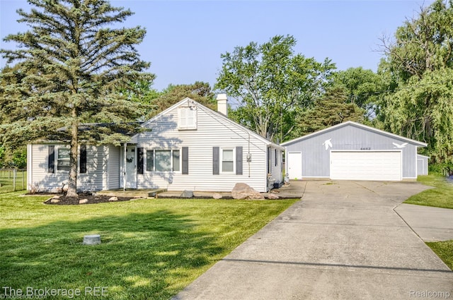 4462 Dye Rd, Swartz Creek, MI 48473 - view of front of house with a garage, a front yard, and a chimney