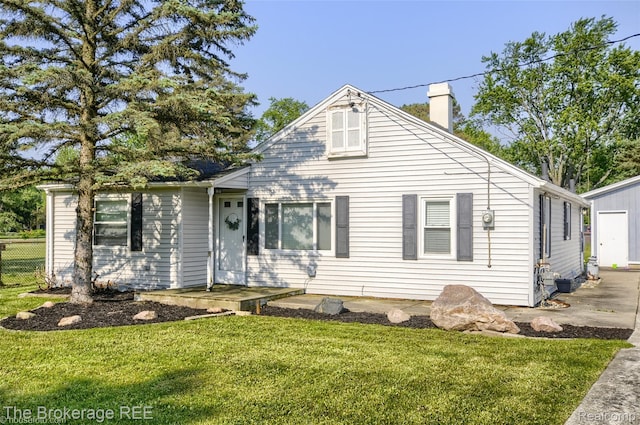 4462 Dye Rd, Swartz Creek, MI 48473 - view of front of home featuring a chimney