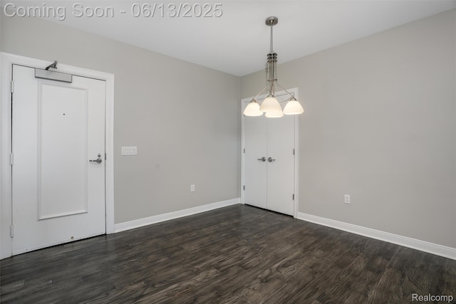 525 W Lafayette Blvd Unit 19C, Detroit, MI 48226 - empty room with dark wood-type flooring and baseboards