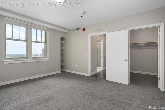 525 W Lafayette Blvd Unit 19C, Detroit, MI 48226 - unfurnished bedroom with carpet and a walk in closet